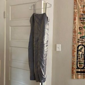 Dress/gown. Light blue with a hint of metallic. Form fitting. Spaghetti strap.